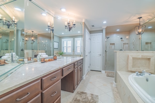 bathroom featuring tile patterned floors, vanity, separate shower and tub, and ornamental molding