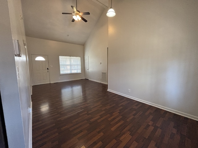 unfurnished living room featuring ceiling fan, dark hardwood / wood-style flooring, and high vaulted ceiling