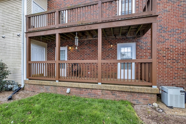 property entrance with a deck