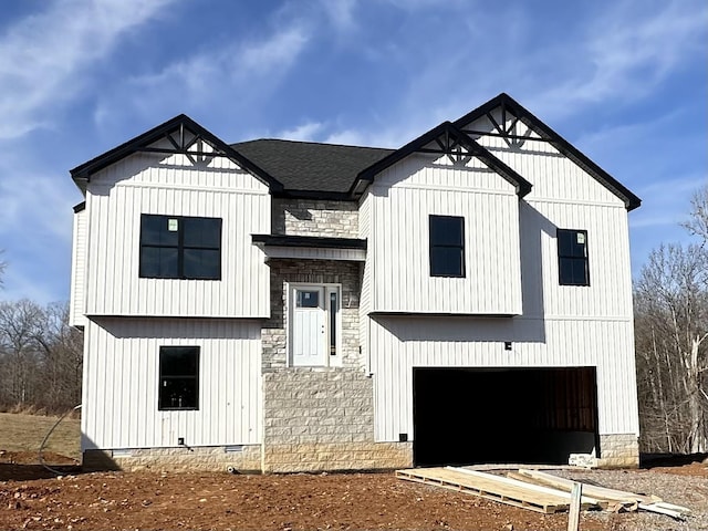 modern farmhouse style home with a garage