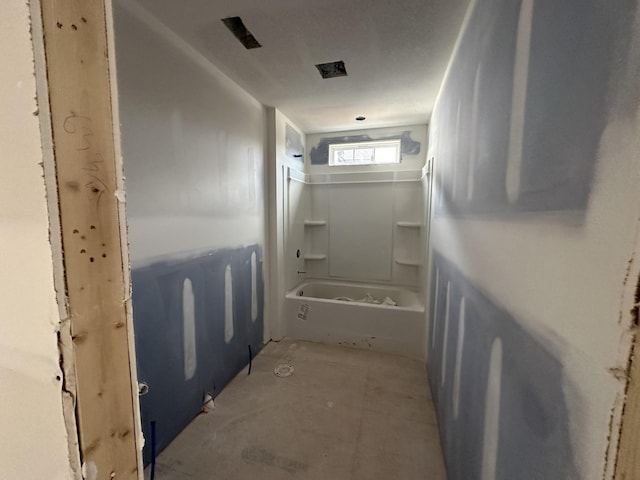 bathroom with shower / bath combination