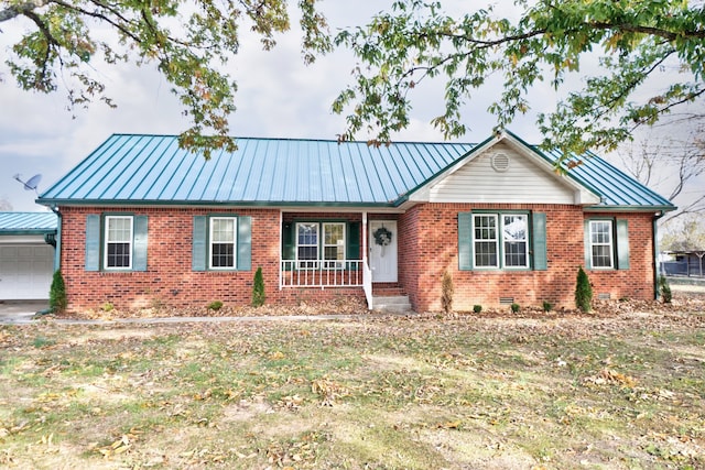 ranch-style home with a porch and a garage