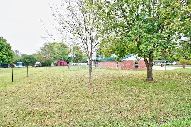 view of yard with a storage shed