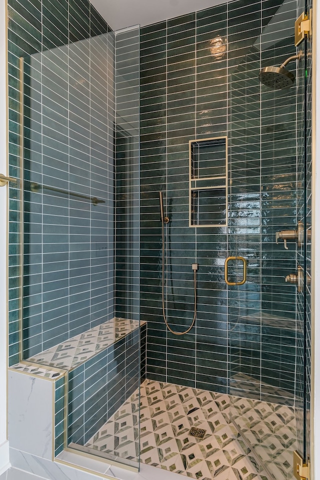 bathroom with an enclosed shower