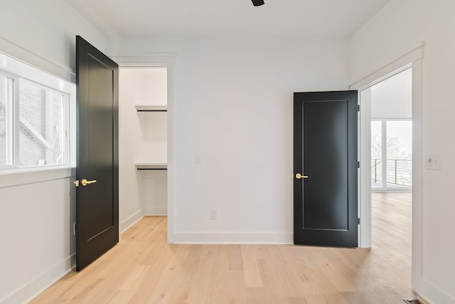 unfurnished bedroom with light hardwood / wood-style flooring