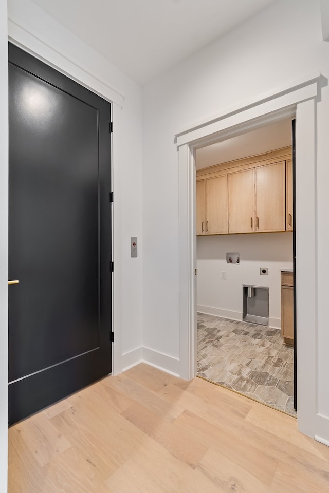 mudroom featuring light wood-type flooring