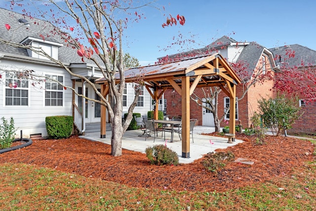 surrounding community featuring a patio area