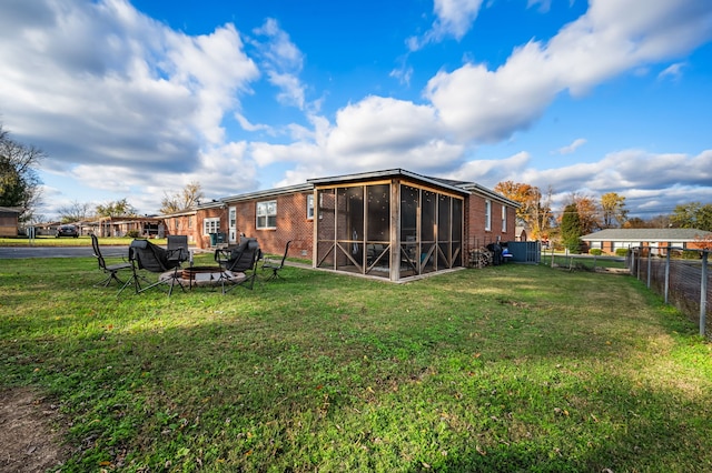 view of yard featuring a sunroom