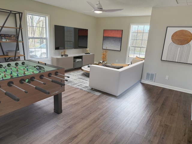 playroom featuring hardwood / wood-style flooring and ceiling fan