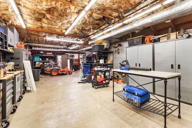 garage with a workshop area