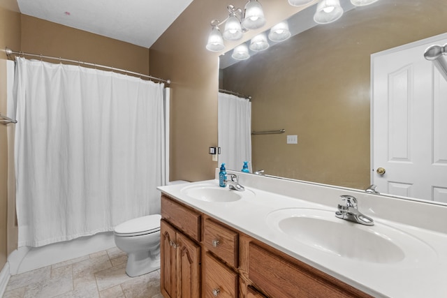 full bathroom with shower / bathtub combination with curtain, vanity, and toilet