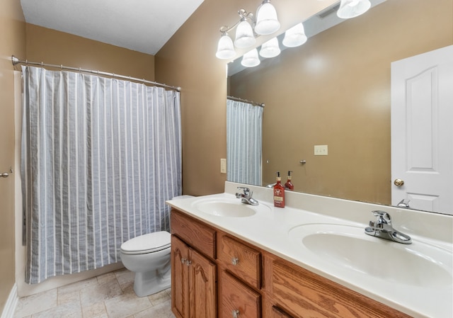 bathroom featuring a shower with curtain, vanity, toilet, and a notable chandelier