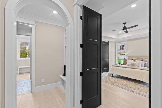 hallway with light wood-type flooring