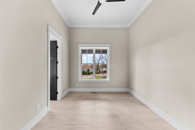 spare room featuring ceiling fan and light wood-type flooring