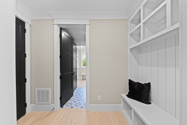 mudroom featuring wood-type flooring