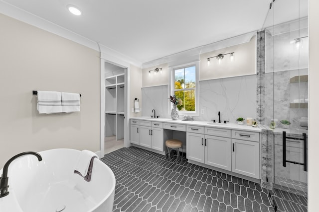 bathroom with shower with separate bathtub and vanity