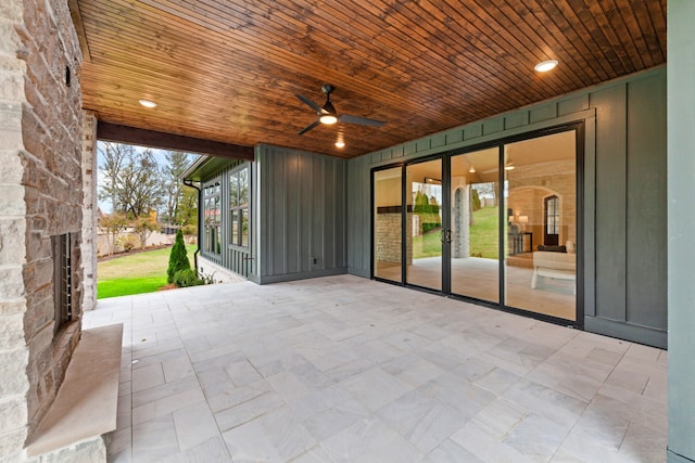 view of patio / terrace featuring ceiling fan