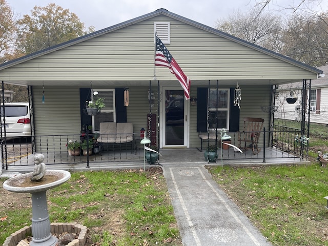 bungalow-style home with covered porch