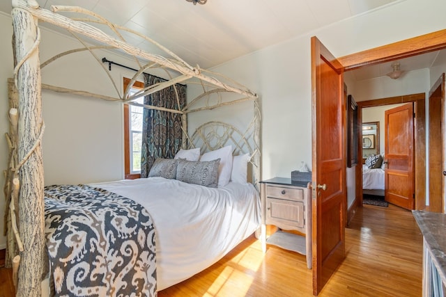 bedroom with light hardwood / wood-style flooring