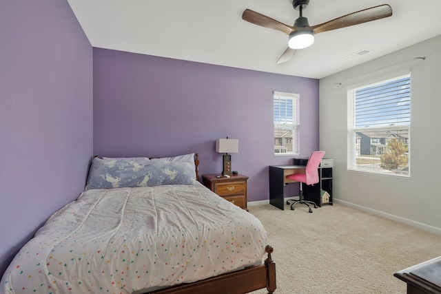 bedroom featuring ceiling fan and light colored carpet