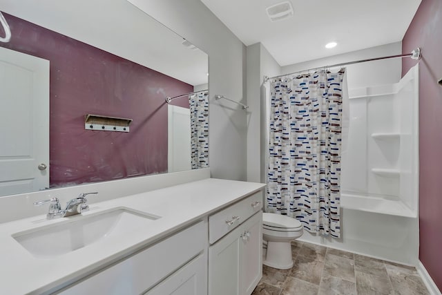 full bathroom featuring shower / bath combination with curtain, toilet, and vanity