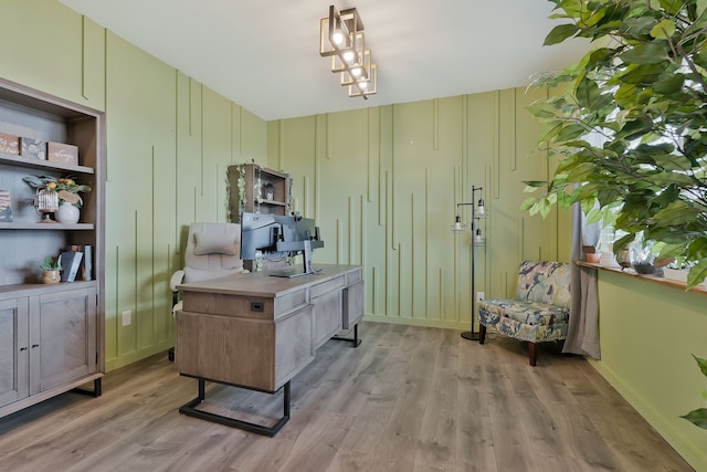 office area with light hardwood / wood-style floors