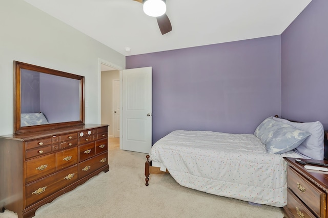 bedroom featuring ceiling fan and light colored carpet