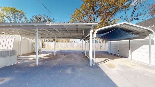 view of parking with a carport