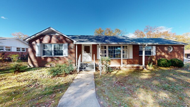 400 Edgewood Dr, Tullahoma, TN 37388 - view of front of property with brick siding and entry steps