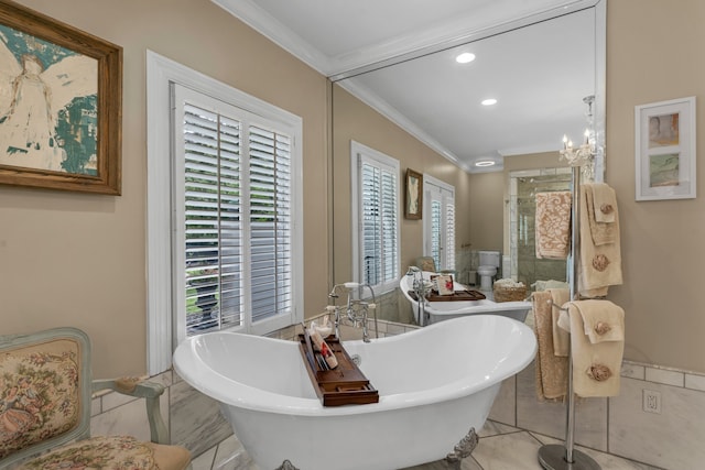 bathroom with a bath, crown molding, a notable chandelier, and tile patterned floors