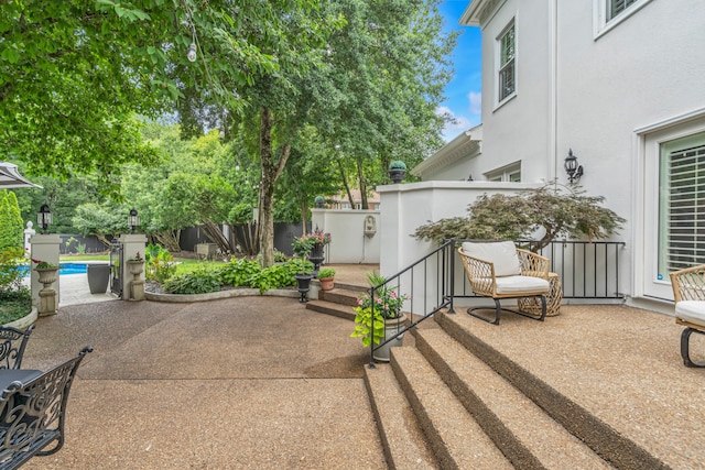 view of patio / terrace featuring a fenced in pool and a fenced backyard