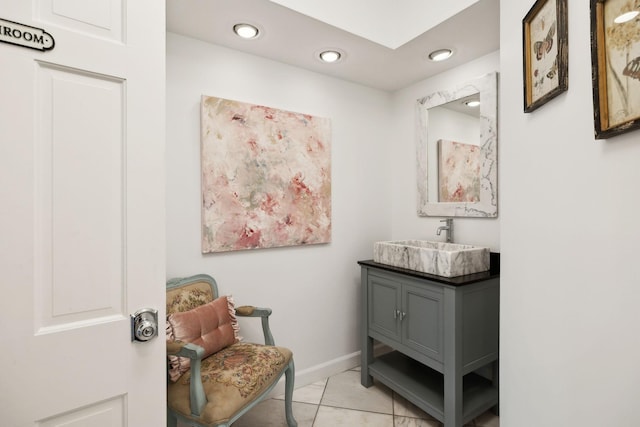 bathroom featuring tile patterned flooring, recessed lighting, vanity, and baseboards