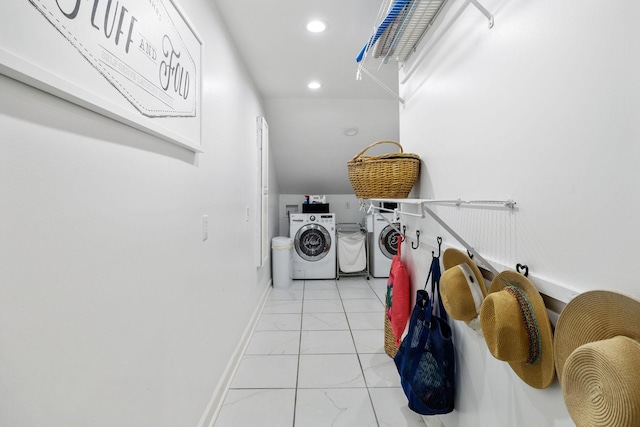 laundry room with marble finish floor, washer and dryer, recessed lighting, baseboards, and laundry area