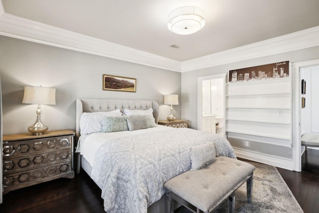 bedroom featuring visible vents, dark wood-type flooring, and crown molding