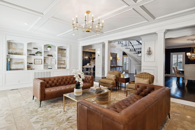 living area with a decorative wall, an inviting chandelier, coffered ceiling, and ornate columns