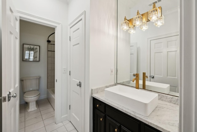 bathroom with toilet, marble finish floor, vanity, a chandelier, and shower / bathtub combination