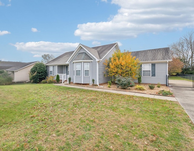 single story home with a front yard