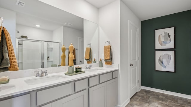 bathroom with vanity and walk in shower