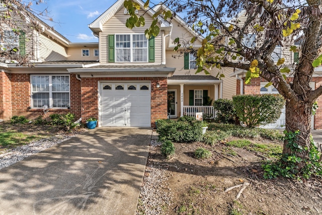 view of front of property with a garage and covered porch