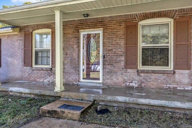 property entrance featuring covered porch