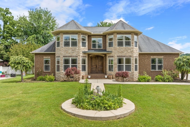 view of front of home with a front yard