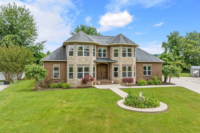 view of front of home with a front lawn