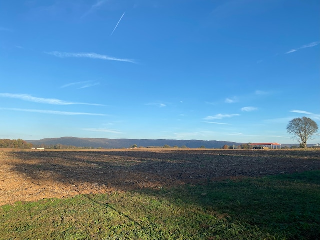 view of mountain feature featuring a rural view