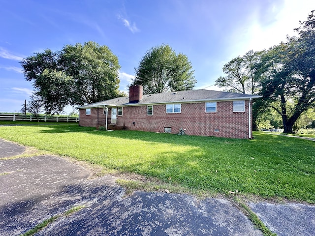 exterior space with a lawn