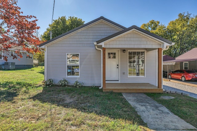 bungalow-style house featuring a front yard and a porch