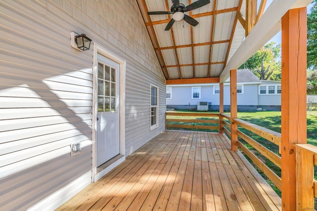 wooden terrace featuring ceiling fan