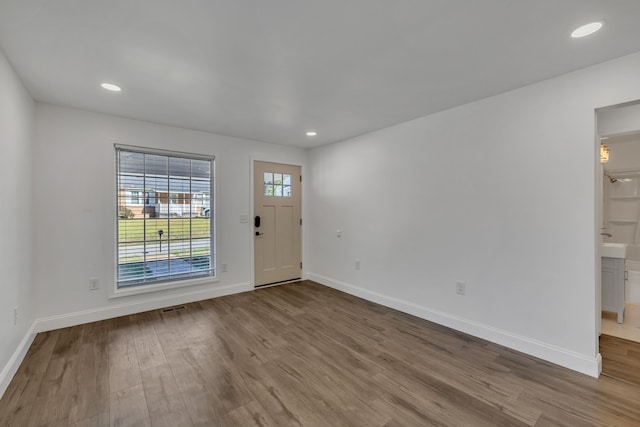 foyer entrance featuring hardwood / wood-style flooring