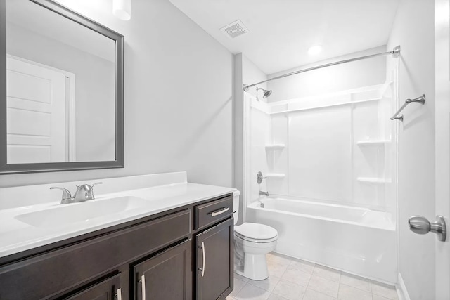 full bathroom with tile patterned flooring, vanity,  shower combination, and toilet