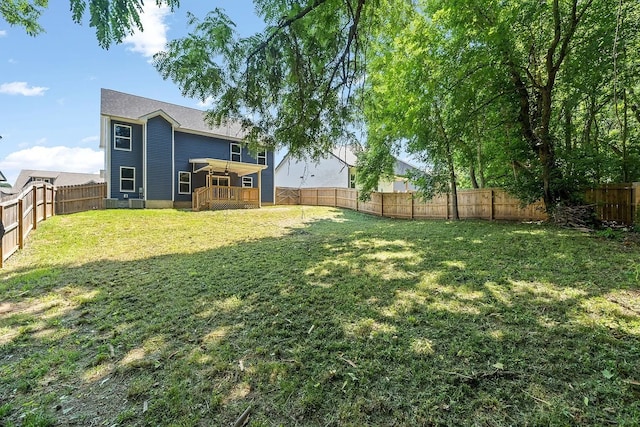 view of yard featuring a wooden deck