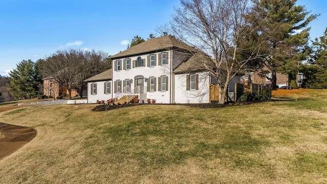 view of front of house with a front lawn